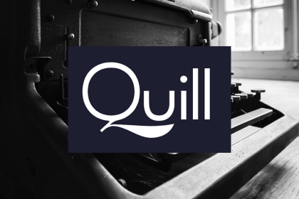 Quill Logo Over a Typewriter