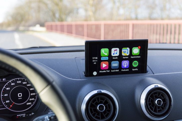 Stock Photo Showing Infotainment System Displayed On Front Dashboard Of Car