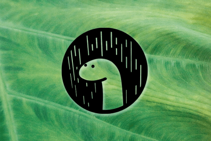 Dino Logo Over Green Leafy Background