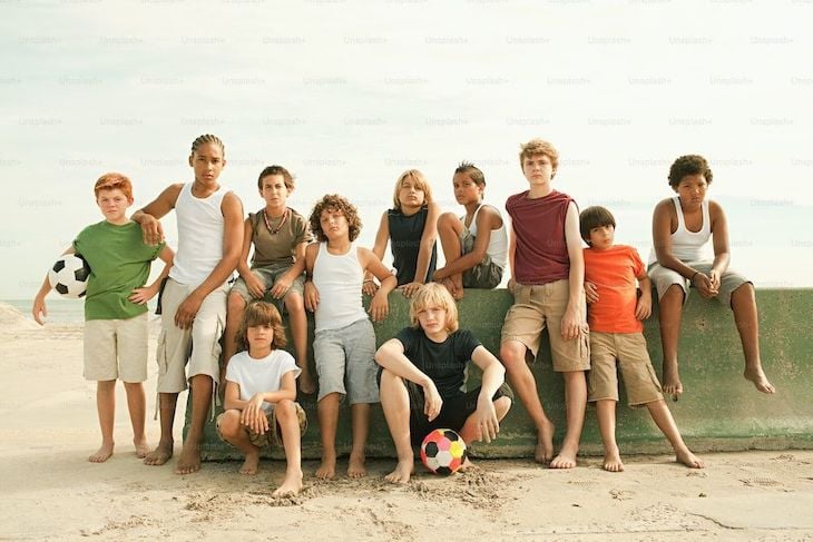 Stock Image Of A Group Of Children Posing On A Beach