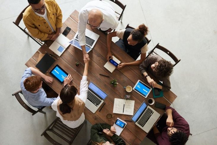 Business People Meeting at Table