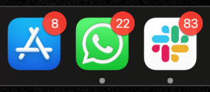 Example of notification badges displayed on App Store, WhatsApp, and Slack icons using the Badging API for PWAs.